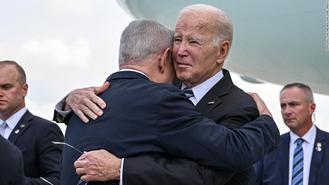 President Biden is greeted by Israeli Prime Minister Netanyahu after arriving at Ben Gurion International Airport in Tel Aviv on October 18.