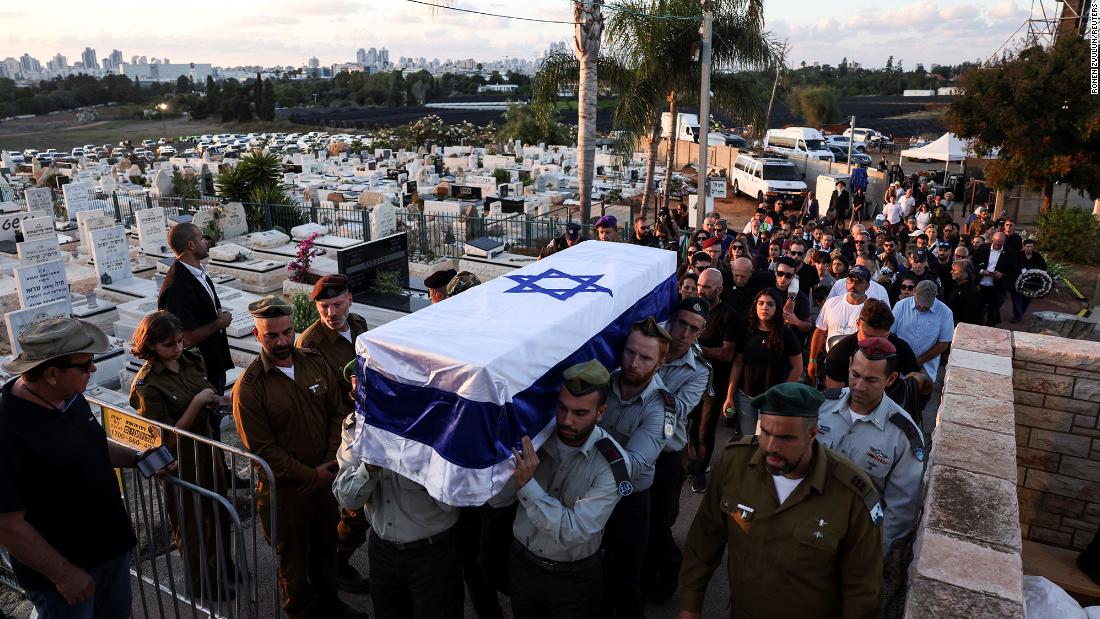 Friends and relatives of Ofir Libstein, who served as head of the Sha&#39;ar HaNegev Regional Council and died during the Kibbutz Kfar Aza attack, mourn at his funeral in Even Yehuda, Israel, on Wednesday, October 18.