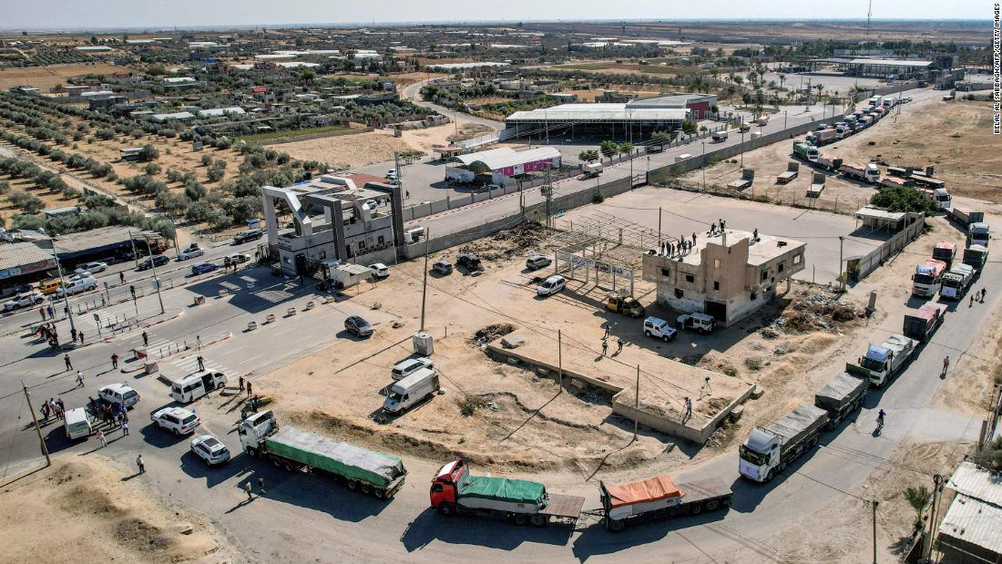 Trucks carrying humanitarian aid enter Gaza from Egypt at the Rafah border crossing on October 21. 