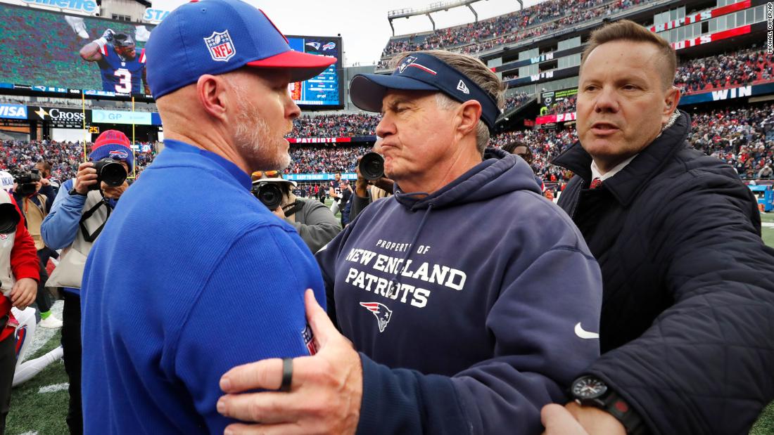 New England Patriots head coach Bill Belichick, right, embraces Buffalo Bills head coach Sean McDermott after the Patriots beat the Bills 29-25 on Sunday, October 22. It was Belichick&#39;s 300th regular-season victory.