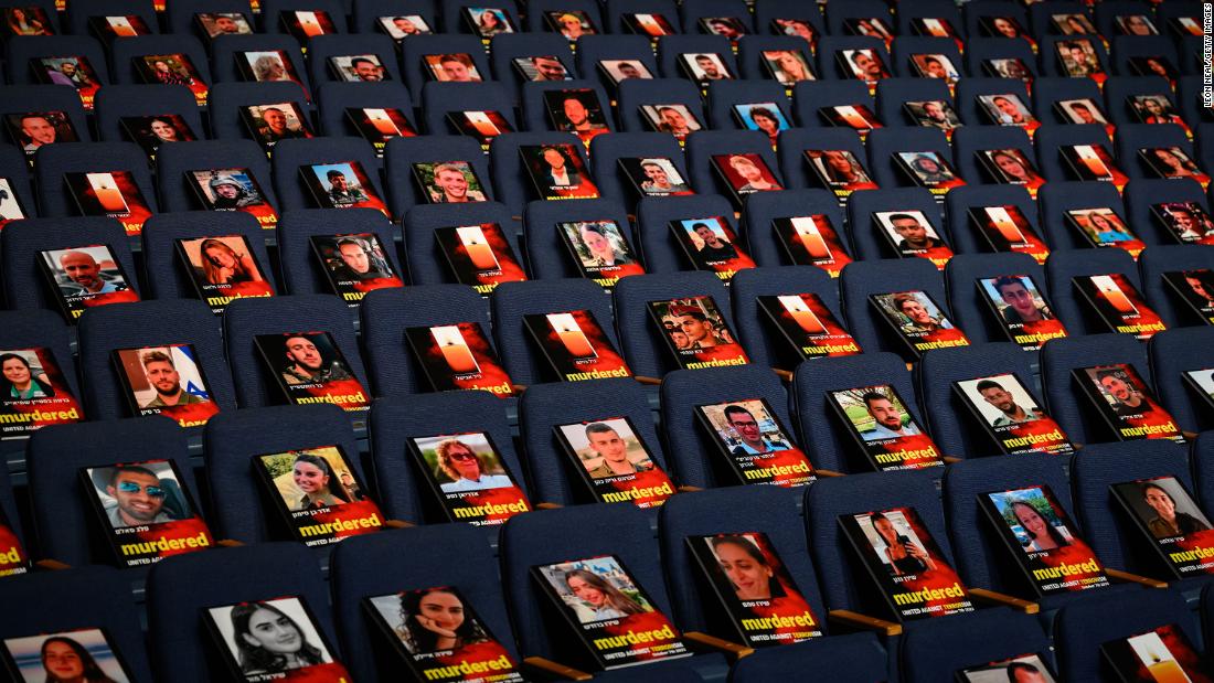 Pictures of over 1,000 people abducted, missing or killed in the Hamas attack are displayed on empty seats in the Smolarz Auditorium at Tel Aviv University in Tel Aviv, Israel, on October 22.