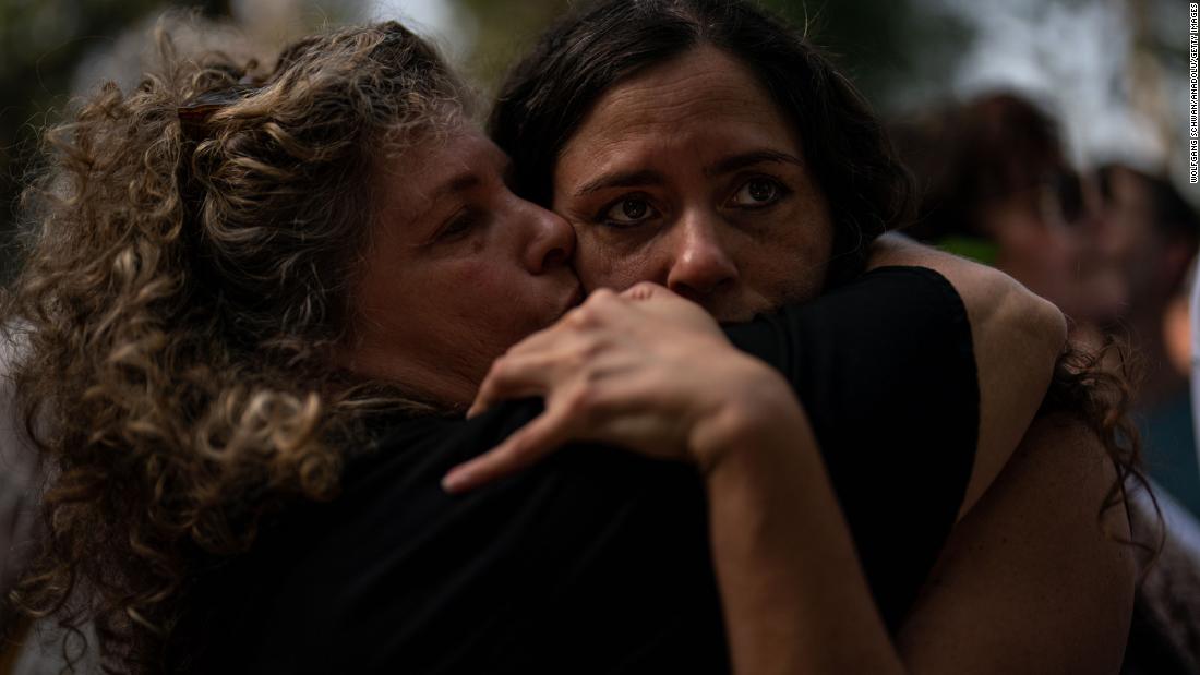 Relatives mourn for a man killed by Hamas during his funeral in Nir Oz, Israel, on October 22.