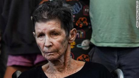 Yocheved Lifshitz, 85, an Israeli grandmother who was held hostage in Gaza for over two weeks, speaks to reporters a day after her release from captivity. 