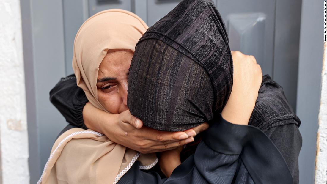 Palestinians mourn their loved ones killed in an Israeli strike, outside Najjar hospital in Rafah, Gaza, on October 24.