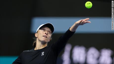 BEIJING, CHINA - OCTOBER 08: Iga Swiatek of Poland serves during the Women&#39;s Singles final match against Liudmila Samsonova day 13 of the 2023 China Open at National Tennis Center on October 08, 2023 in Beijing, China. (Photo by Emmanuel Wong/Getty Images)