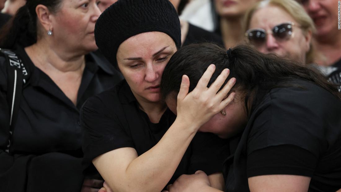Manna mourns her daughter Tamar Chaya Torpiashvili, a 9-year-old girl who died days after experiencing a cardiac attack during a siren warning of incoming rockets being fired from Gaza into Israel, at her funeral in Ashdod, southern Israel, on October 29.
