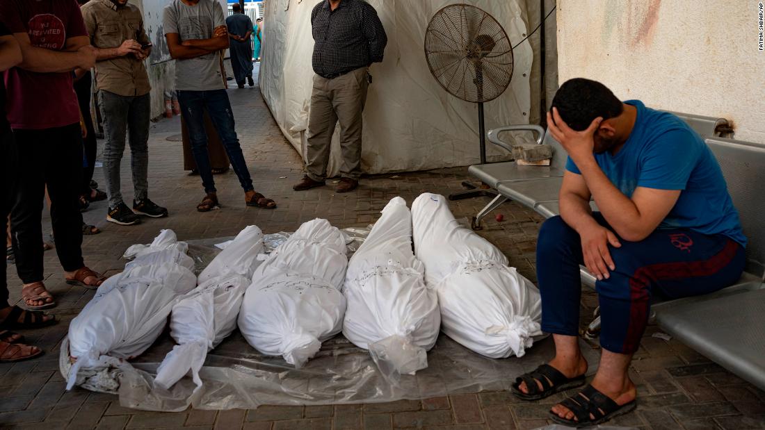 Palestinians mourn relatives killed in the Israeli airstrikes in Rafah on October 30.