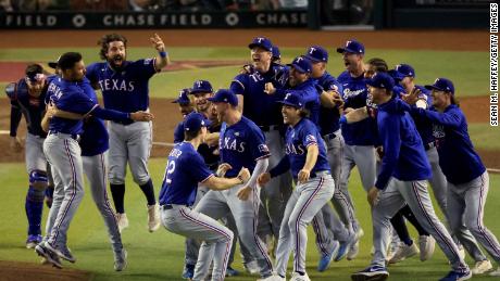 The Texas Rangers celebrate after beating the Arizona Diamondbacks 5-0 in Game Five to win the World Series at Chase Field on November 01, 2023 in Phoenix, Arizona.