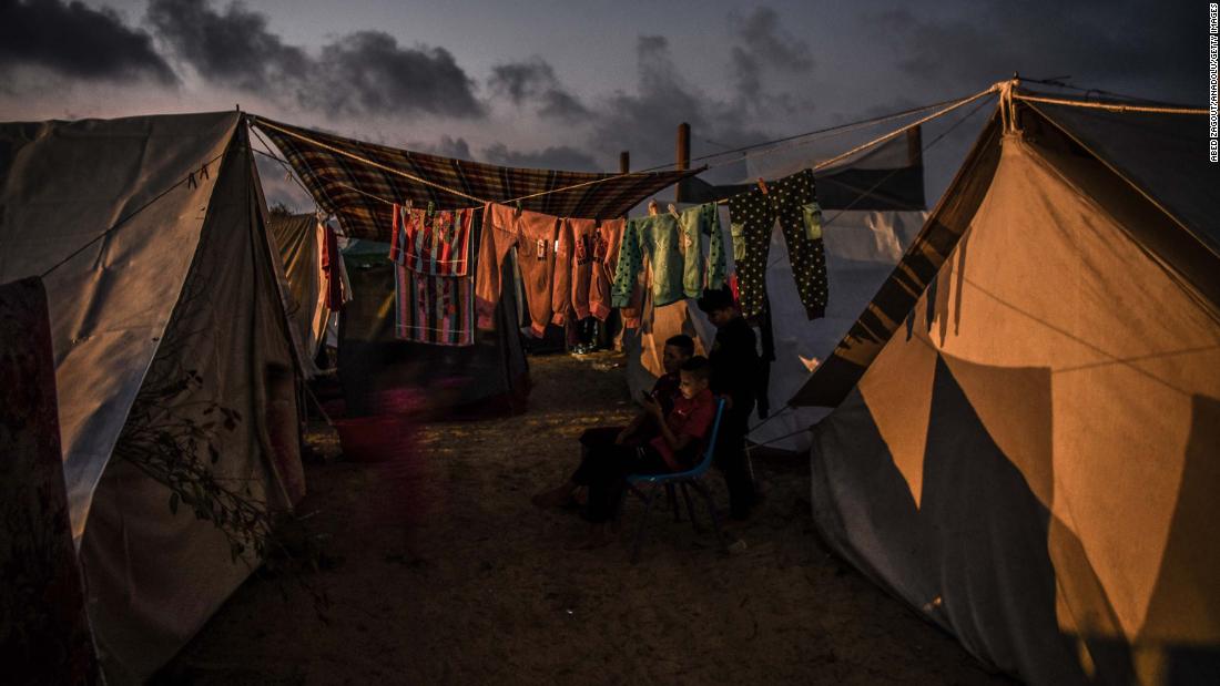 Palestinian families take shelter in the United Nations Relief and Works Agency refugee camp in Khan Younis, Gaza, on November 1.