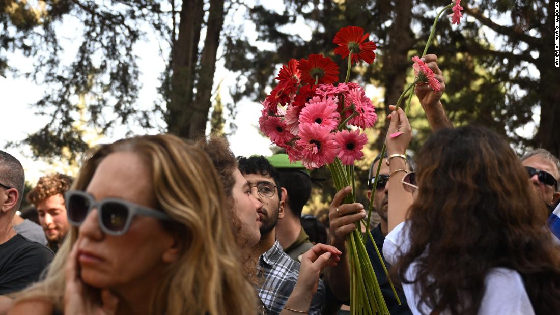 Family and friends grieve for Capt. (Res.) Yuval Zilber at the Netaim Cemetery in Netaim, Israel, on November 3.