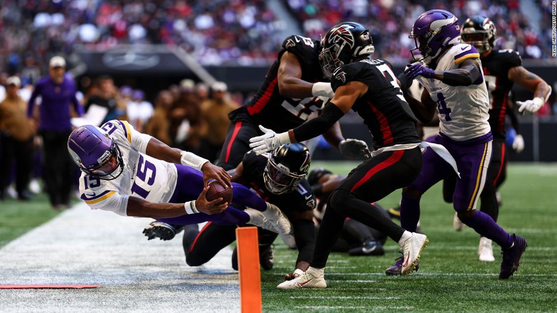 Minnesota Vikings backup quarterback &lt;a href=&quot;https://www.cnn.com/2023/11/05/sport/vikings-josh-dobbs-spt/index.html&quot; target=&quot;_blank&quot;&gt;Joshua Dobbs&lt;/a&gt; reaches for the pylon during the Vikings&#39; 31-28 victory over the Atlanta Falcons on November 5. Dobbs, who was acquired by the Vikings in a trade last week, threw for 158 yards with two touchdowns in the air and one on the ground.