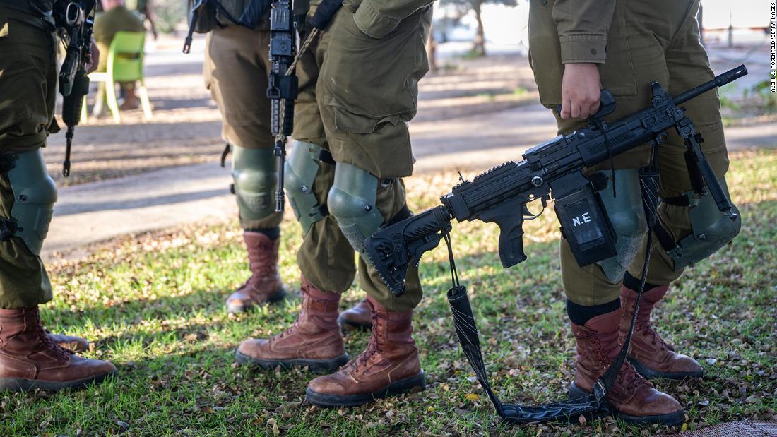 Soldiers from the IDF&#39;s coed infantry battalion &#39;Bardelas&#39; guard an Israeli community in Southern Israel on November 5.