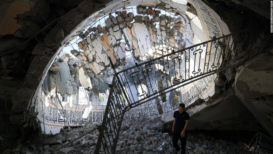 Palestinians inspect debris at the Khaled Ibn Al-Walid mosque after it was hit by an Israeli bombardment in Khan Younis, on November 8.