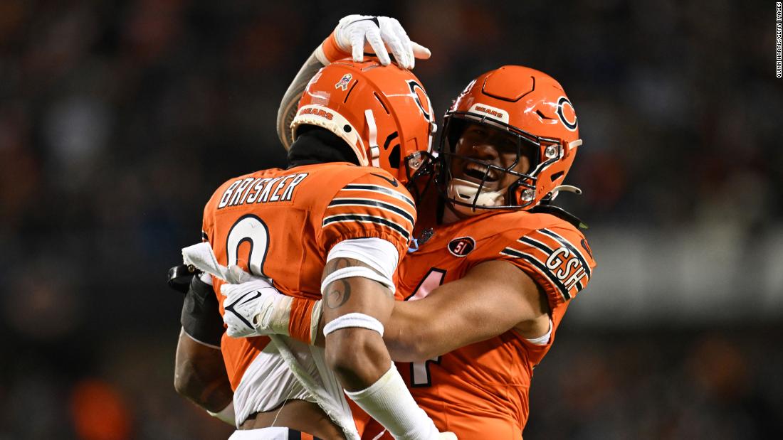 Noah Sewell, right, and Jaquan Brisker of the Chicago Bears celebrate during the Bears&#39; 16-13 Thursday Night Football win over the Carolina Panthers on November 9.