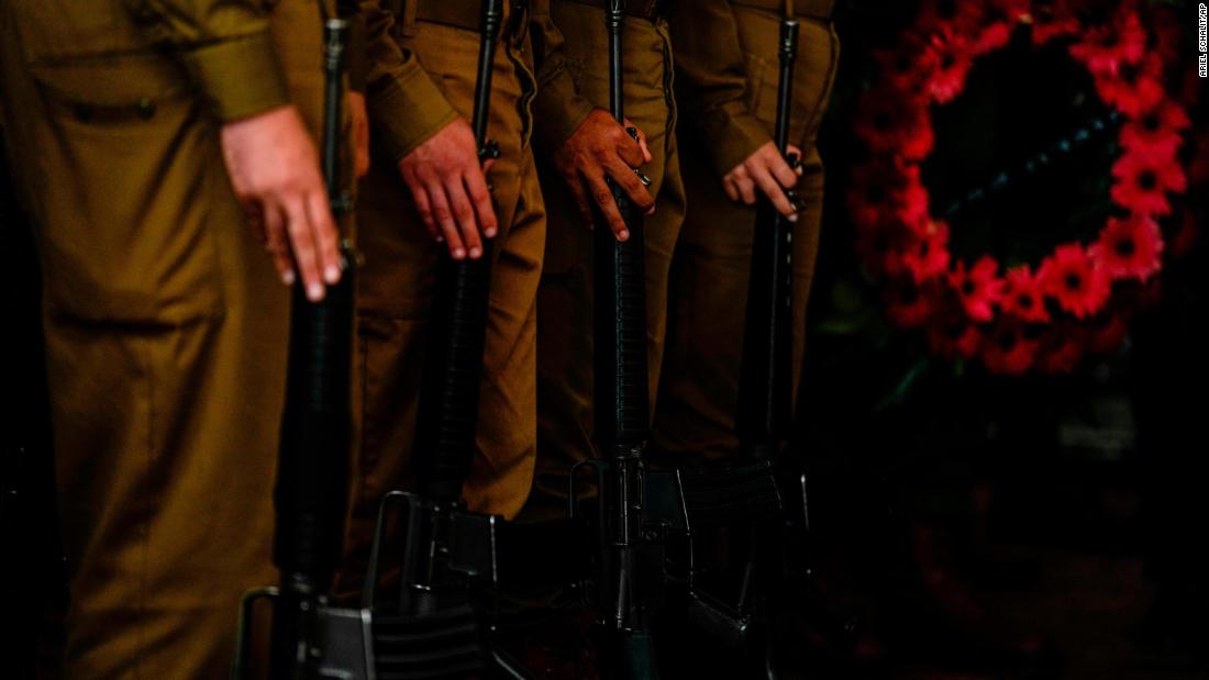 Israeli soldiers form an honor guard at the funeral of Israeli reserve soldier Master Sgt. Raz Abulafia in Rishpon, Israel, on November 14.