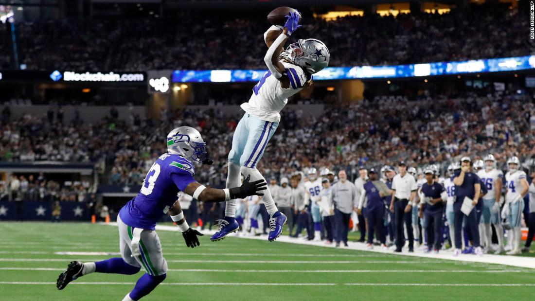 Dallas Cowboys wide receiver Brandin Cooks catches a pass for a first down as Seattle Seahawks safety Jamal Adams defends during the Cowboys&#39; 41-35 Thursday Night Football win on November 30.