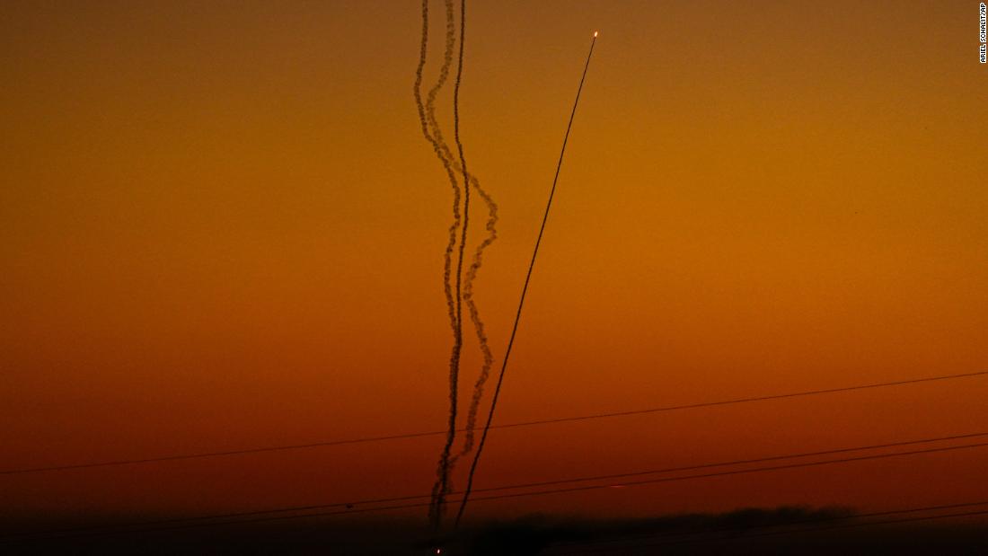 Rockets are fired toward Israel from Gaza, as seen from southern Israel, on December 15.