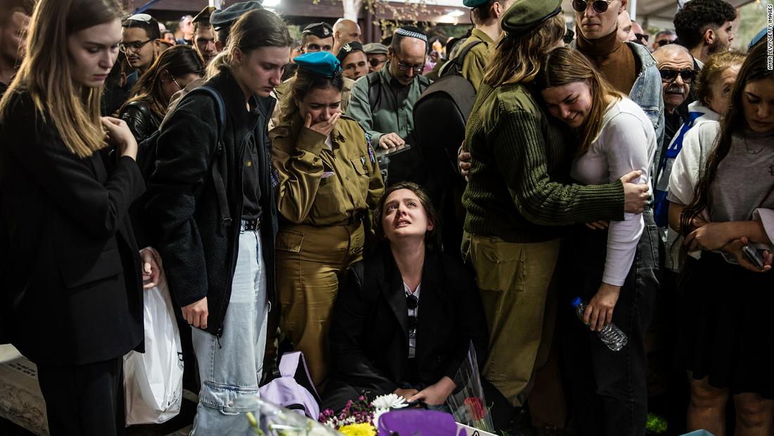 Family and friends react during the funeral for IDF Staff Sgt. Boris Dunavetski in Tel Aviv, Israel, on December 20.