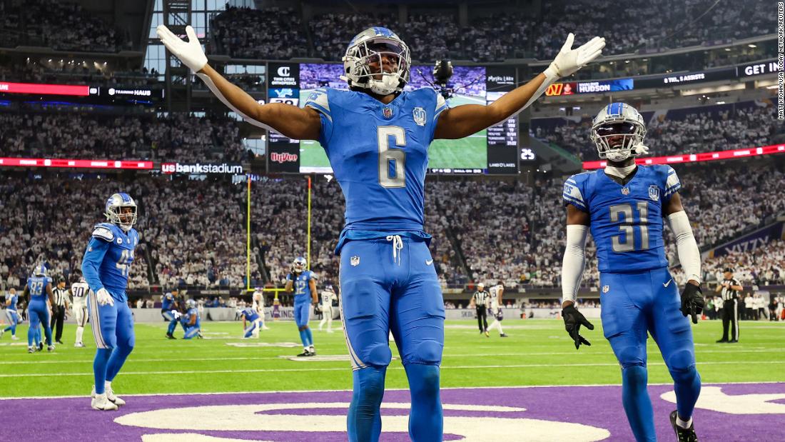 Detroit Lions safety Ifeatu Melifonwu celebrates after he intercepted a pass during the Lions&#39; 30-24 victory over the Minnesota Vikings on Sunday, December 24. The Lions secured their fist division title since 1993 with the win.