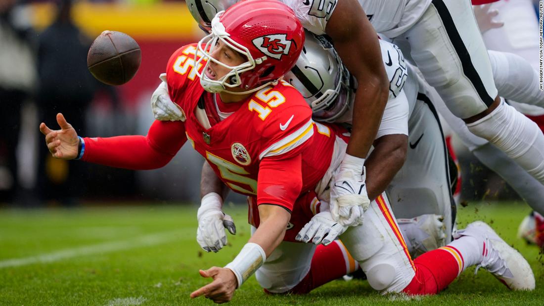 Kansas City Chiefs quarterback Patrick Mahomes recovers his fumble as he is hit during the &lt;a href=&quot;https://www.cnn.com/2023/12/27/sport/kansas-city-chiefs-las-vegas-raiders-spt-intl/index.html&quot; target=&quot;_blank&quot;&gt;Chiefs&#39; disappointing 20-14 loss&lt;/a&gt; to the Las Vegas Raiders on December 25. The loss ensured the Chiefs cannot earn the No.1 seed in the AFC and postponed the sealing of their eighth consecutive AFC West title, as they fell to 9-6.