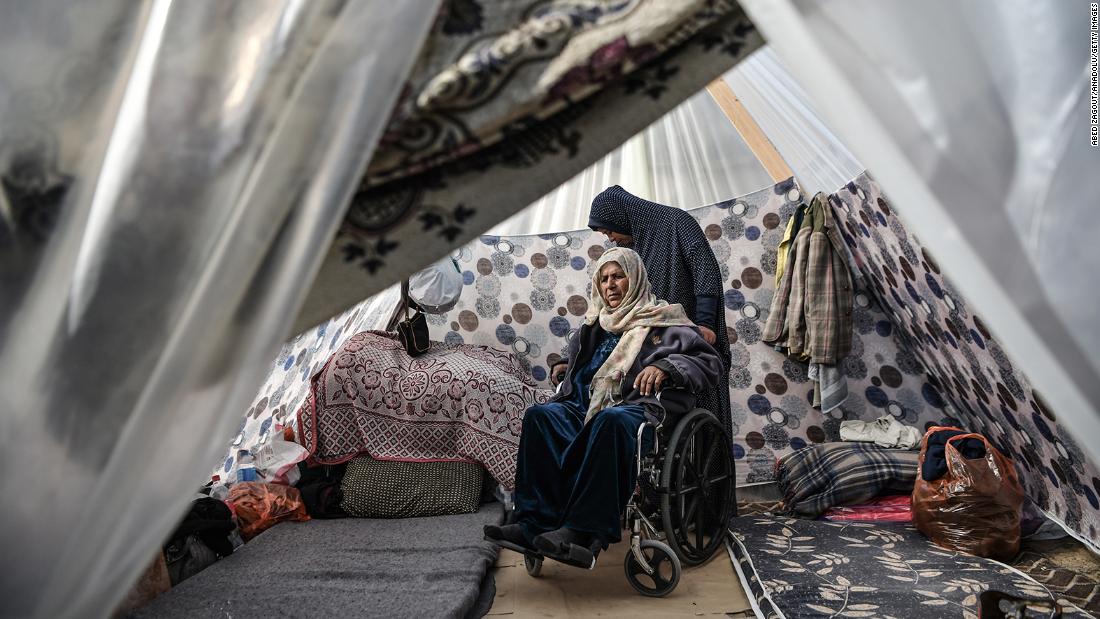 Palestinians displaced by Israeli bombardment take shelter in a makeshift tent in Rafah, Gaza on January 1, 2024.