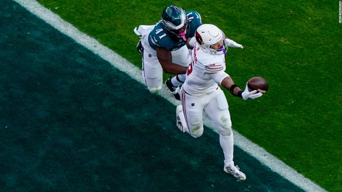 Arizona Cardinals running back James Conner makes a one-handed touchdown catch in front of Philadelphia Eagles linebacker Nicholas Morrow on Sunday, December 31. The Cardinals beat the Eagles 35-31.