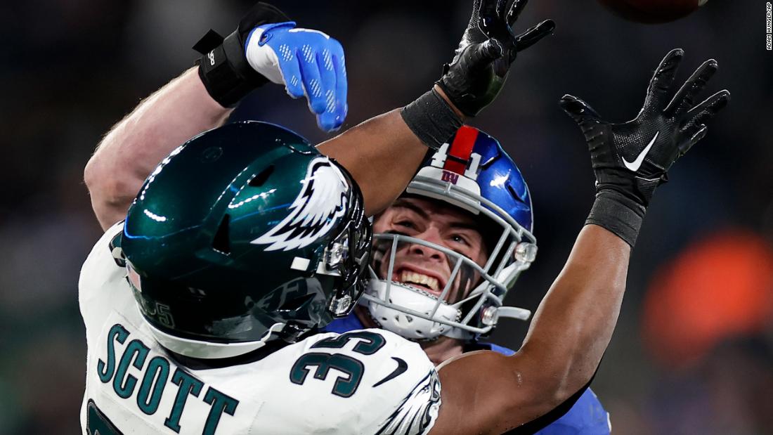 New York Giants linebacker Micah McFadden breaks up a pass intended for Philadelphia Eagles running back Boston Scott on January 7. The Giants upset the Eagles 27-10 to end their season on a winning note. The Eagles made the playoffs as a wild-card team.