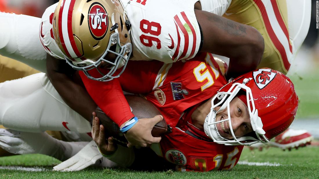 49ers defensive lineman Javon Hargrave covers up Mahomes. Mahomes was frequently under pressure in the first half, and the 49ers sacked him twice.