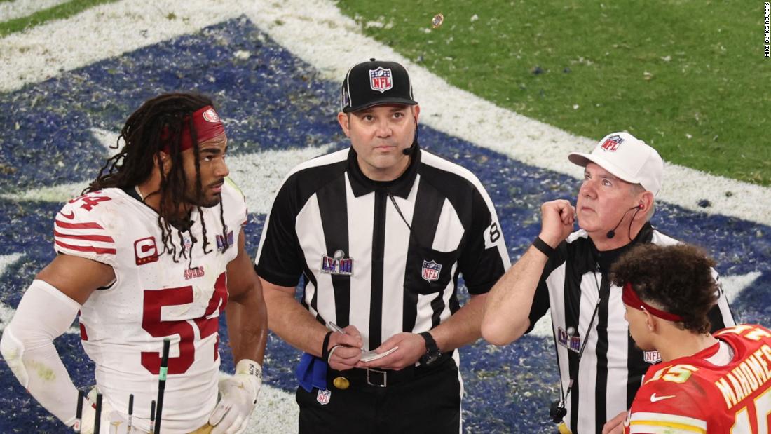Referee Bill Vinovich performs the coin toss before overtime. This was just the second Super Bowl in history to go to overtime.
