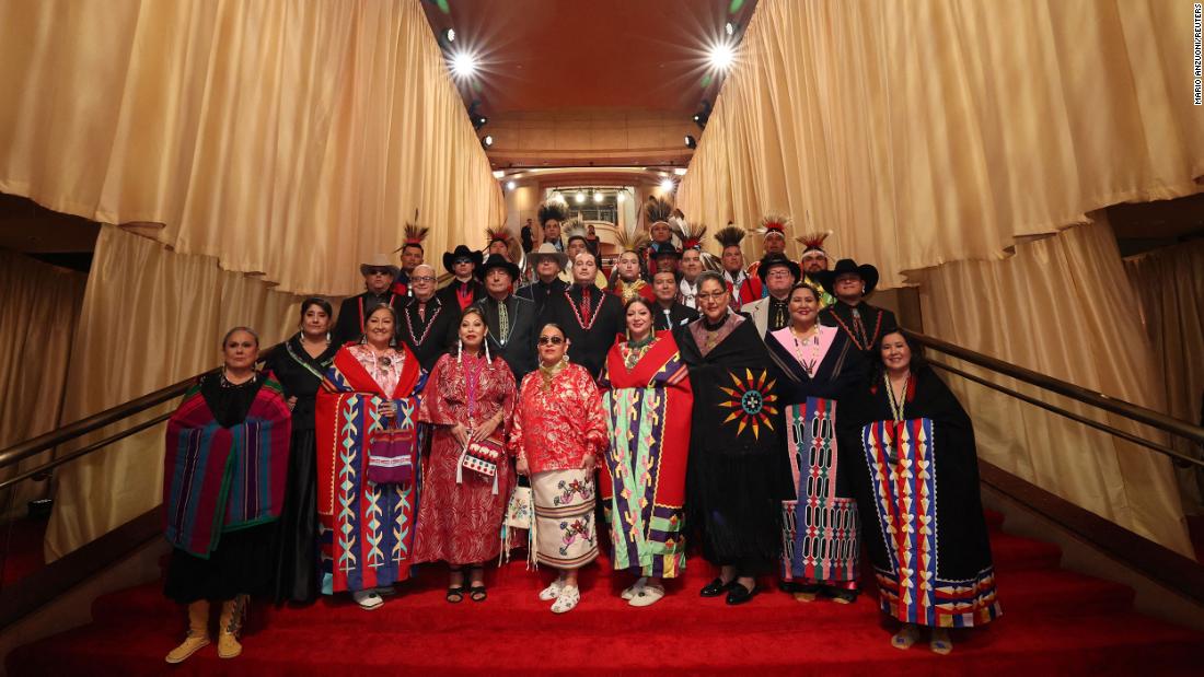 Members of the Osage Nation &lt;a href=&quot;https://www.cnn.com/entertainment/live-news/oscars-academy-awards-03-10-24/h_86275623b92d4fc851a6f54944d29cc9&quot; target=&quot;_blank&quot;&gt;pose on the red carpet&lt;/a&gt; before the show. Some members of the tribe collaborated with director Martin Scorsese on &quot;Killers of the Flower Moon,&quot; a film that recounts a dark and painful chapter of Osage history.