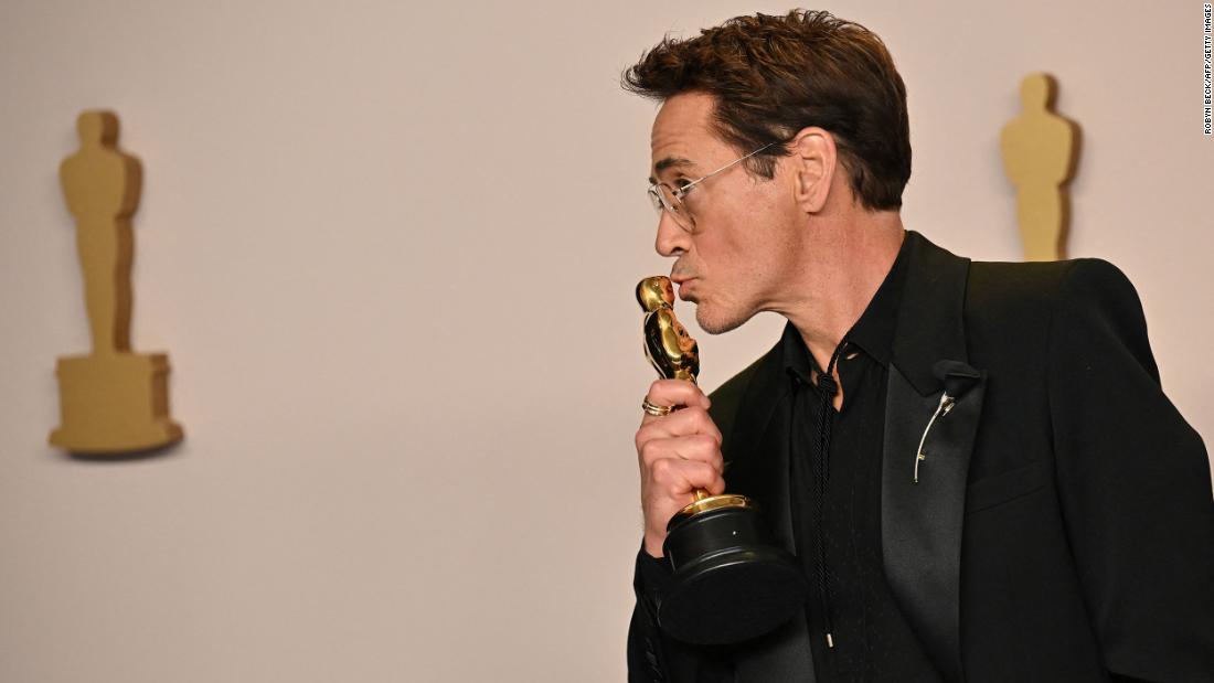 Robert Downey Jr. poses in the press room with the Oscar he won for best supporting actor. &quot;I&#39;d like to thank my terrible childhood and the Academy,&quot; &lt;a href=&quot;https://www.cnn.com/entertainment/live-news/oscars-academy-awards-03-10-24/h_b112e2122ef918d2e30085505f824aae&quot; target=&quot;_blank&quot;&gt;he said in his acceptance speech&lt;/a&gt;. &quot;In that order.&quot;