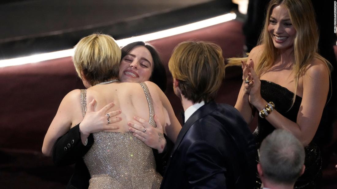 &quot;Barbie&quot; director Greta Gerwig, left, congratulates Billie Eilish after Eilish and her brother, Finneas, won the Oscar for best original song (&quot;What Was I Made For?&quot;).