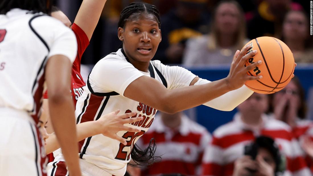 Katie Peneueta of the NC State Wolfpack looks for an opening during the first half.