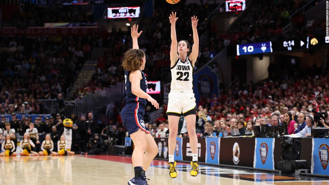 Clark shoots the ball over UConn&#39;s Ashlynn Shade. UConn held Clark to six points, while shooting 3-of-11 from the field, including 0-6 from the three-point line.