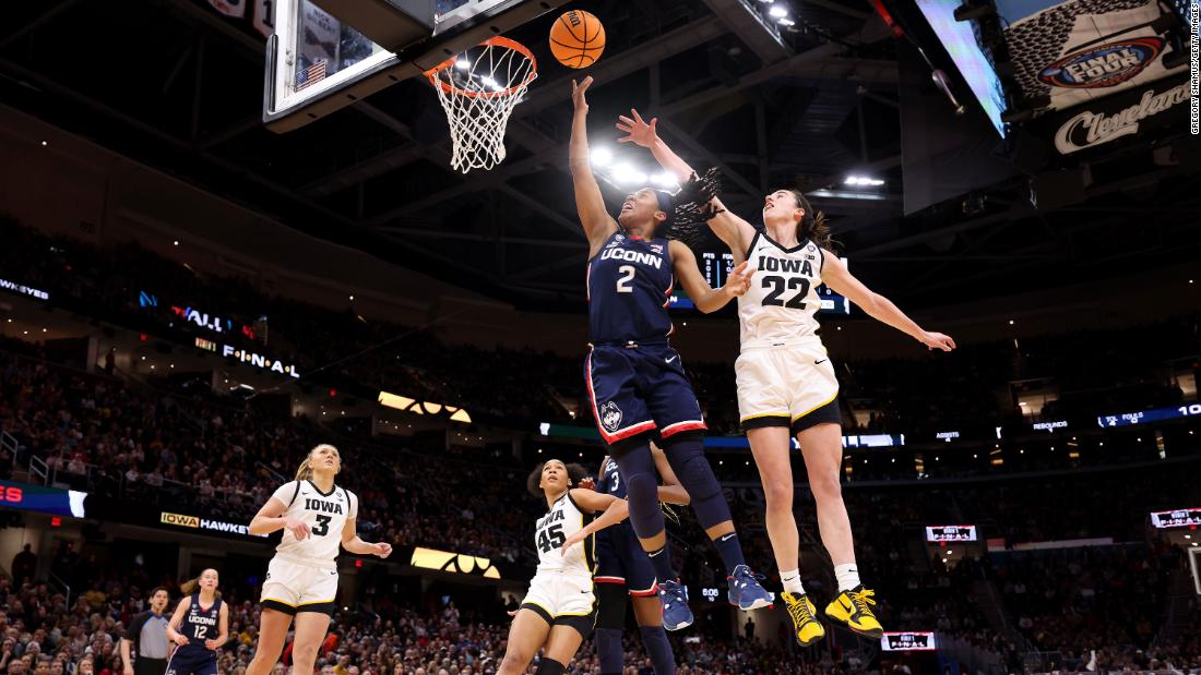 UConn&#39;s KK Arnold shoots the ball over Clark.