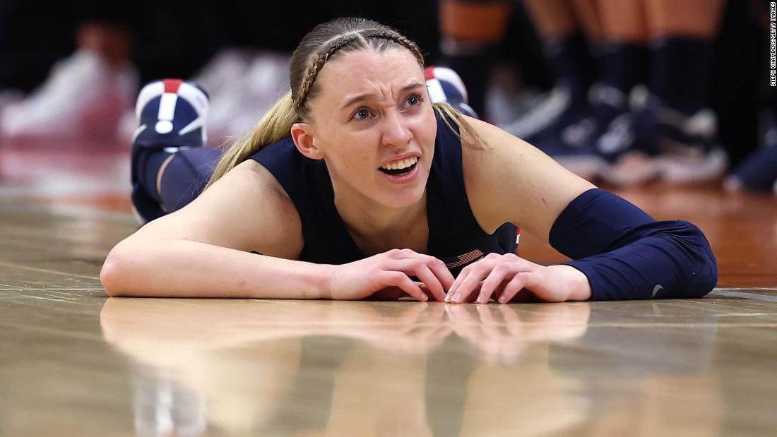 UConn guard Paige Bueckers lays on the floor in the second half.