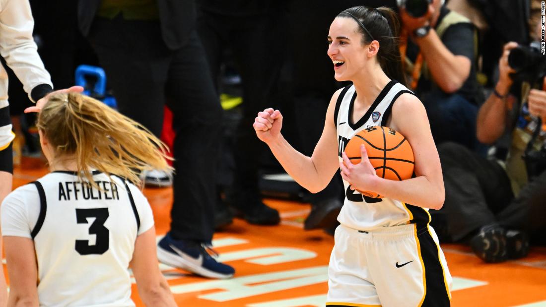 Iowa&#39;s Caitlin Clark celebrates after the game. Clark finished with 21 points, nine rebounds and seven assists.