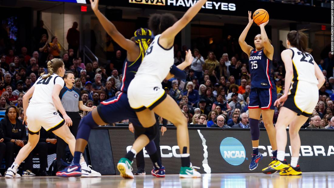 Ice Brady of the UConn Huskies shoots the ball.