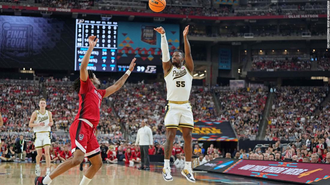 Purdue guard Lance Jones shoots the ball against NC State guard Jayden Taylor in the second half. Jones added 14 points during the game.