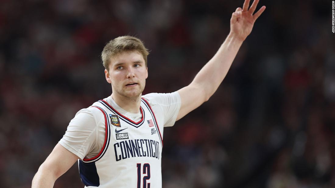 Spencer celebrates after making a shot in the first half. He added 14 points during the game.