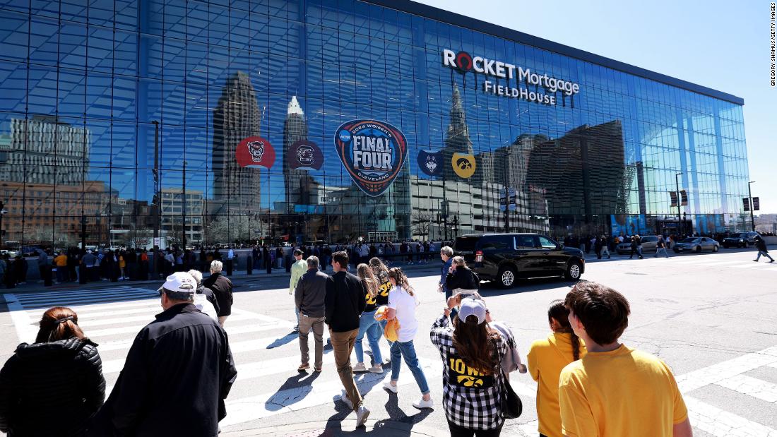 Fans arrive at Rocket Mortgage FieldHouse ahead of the national championship game between the Hawkeyes and the Gamecocks.