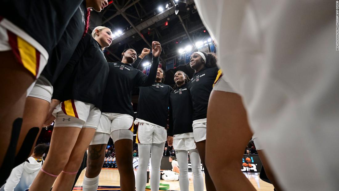 South Carolina players huddle before the game.