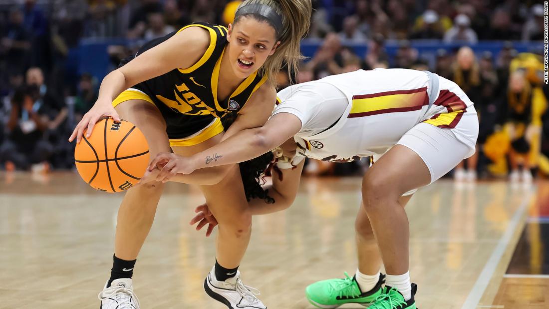 Marshall steals the ball from Te-Hina Paopao of South Carolina.