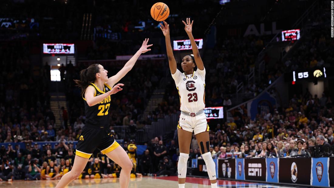 South Carolina&#39;s Bree Hall shoots a three point basket over Clark.