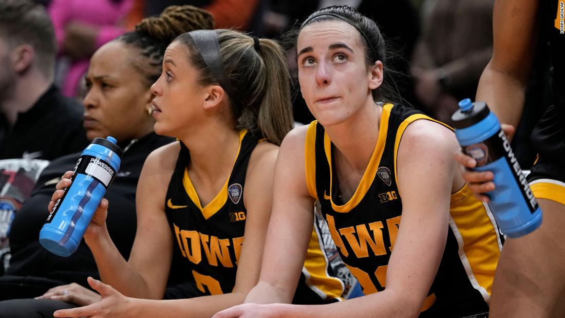 Clark sits on the bench at the end of the game.