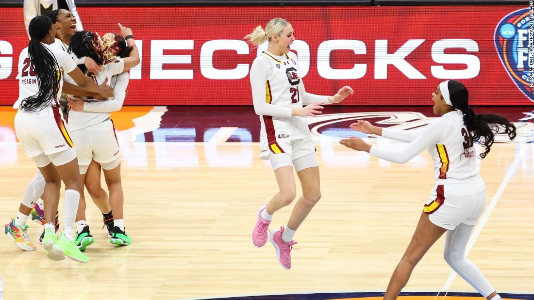 The Gamecocks celebrate after the game.