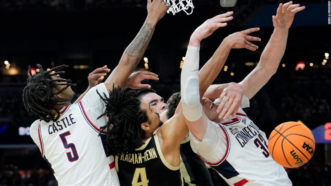 UConn and Purdue players vie for the ball in the first half.