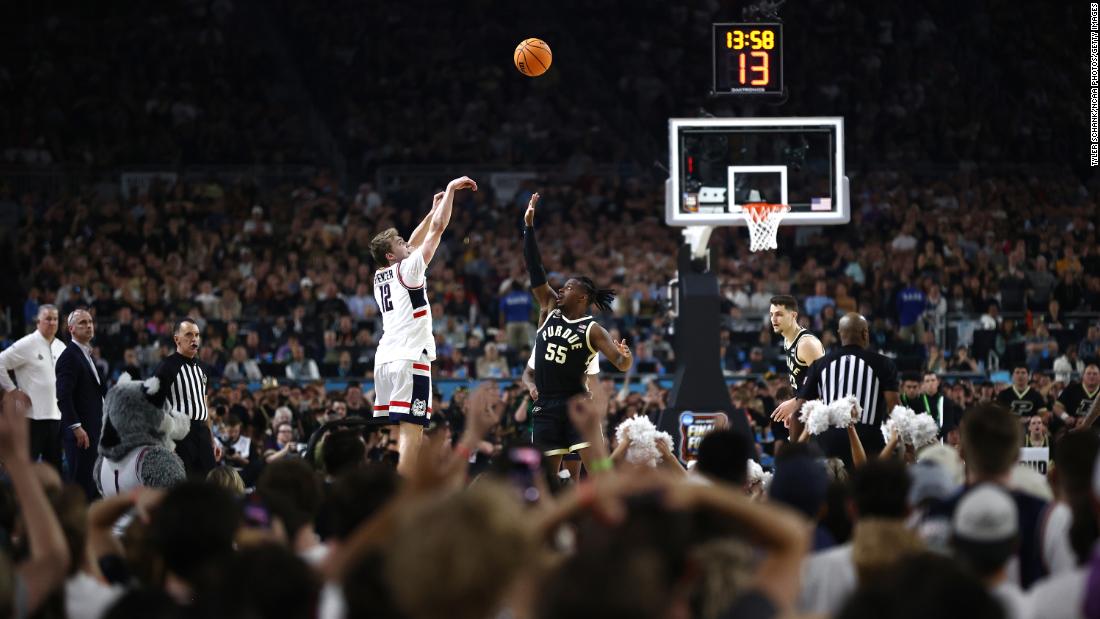 UConn&#39;s Cam Spencer shoots the ball over Purdue&#39;s Lance Jones.