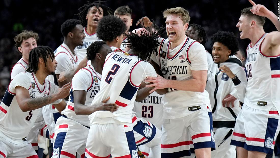 UConn players celebrate after defeating Purdue in the men&#39;s Final Four championship game in Glendale, Arizona, on Monday, April 8.
