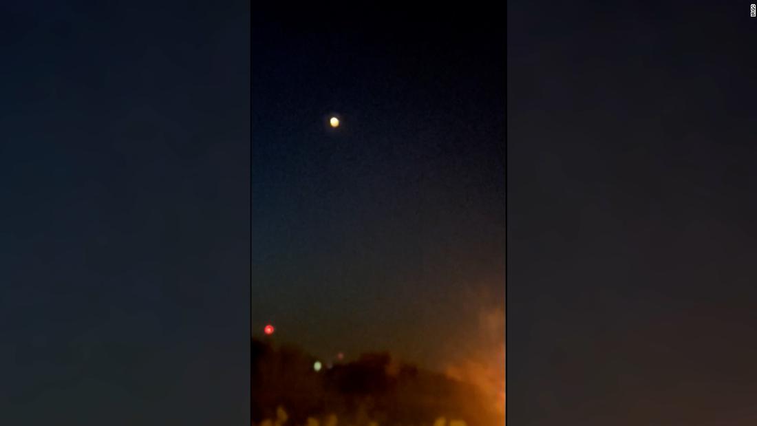 Video shows flashes in sky near location where Israel struck Iran